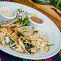Spinach Quesadillas · Chihuahua cheese melted to perfection with sauteed spinach, mushrooms, onion and tomatoes. S...