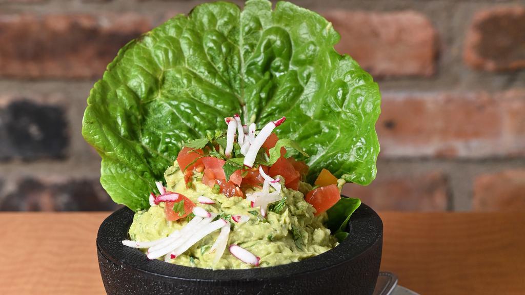 Large Guacamole And Chips · Our guacamole is home-made with only the ripest avocados and the freshest ingredients.