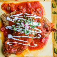 Chile Relleno Dinner · The season's premium poblano peppers stuffed with cheese. Topped with zesty tomato sauce and...