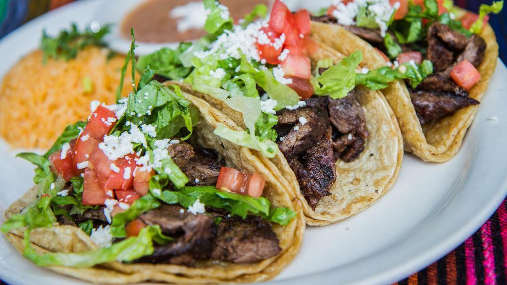Taco Dinner · Most popular. A Mexican favorite. Three soft or hard shell tacos loaded with your choice of filling, topped with lettuce, tomatoes and shredded cheese. Served with rice and beans.