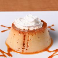 Flan · Vanilla infused custard, drizzled with caramel sauce.