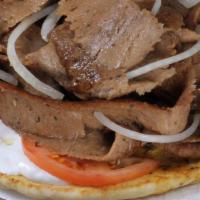 Gyros Sandwich · Our Classic Gyros 

6 oz of perfectly cut and cooked meat
on pita topped with onion, tomato,...