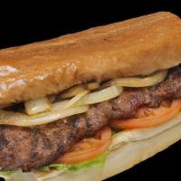 Ribeye Steak Sandwich · Our tender ribeye steak sandwich. 
Flame grilled on roll topped with lettuce, tomato, grille...