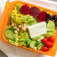 Greek Salad · Romaine, garbanzo, beets, kalamata, tomato, cucumber, feta, peppers.