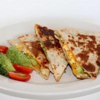 Spinach Avocado Egg Quesadilla · Add Egg, Side of Avocado, Side of Turkey Bacon for an additional charge.