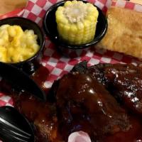 Bbq Chicken Dinner · Grilled chicken served with Big Daddy's own BBQ sauce. Served with cole slaw & baked beans. ...