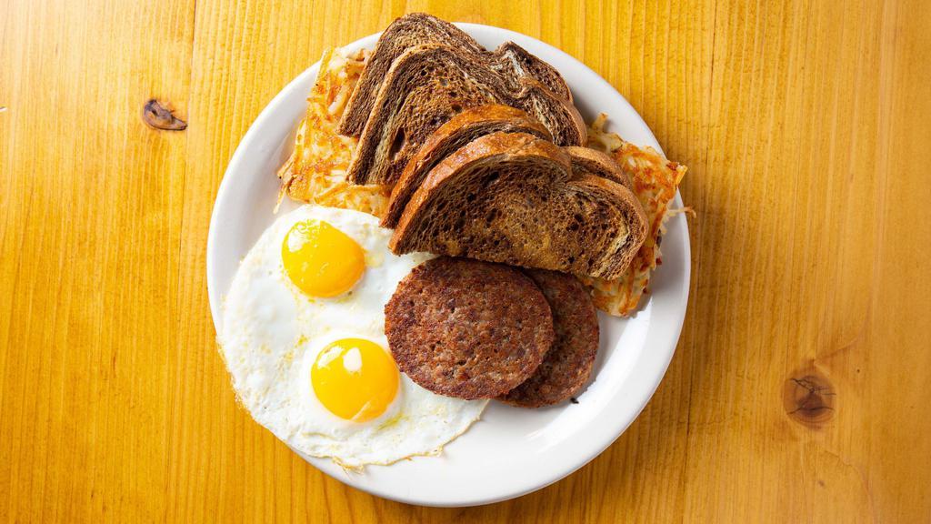 Cozy Breakfast Special · 2 eggs, hash browns, ham, bacon or sausage (links or patty) with toast.