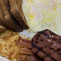Farmer’S Special · 3 eggs, hash browns, bacon, ham, smoked sausage and toast.