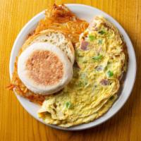 Denver Omelet · Ham, onions, green peppers, cheddar cheese, served with hash browns and toast.
