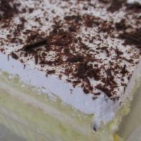 Cassata Cake Slice · Italian yellow cake, two layers, with our signature cannoli filling in between layers, toppe...