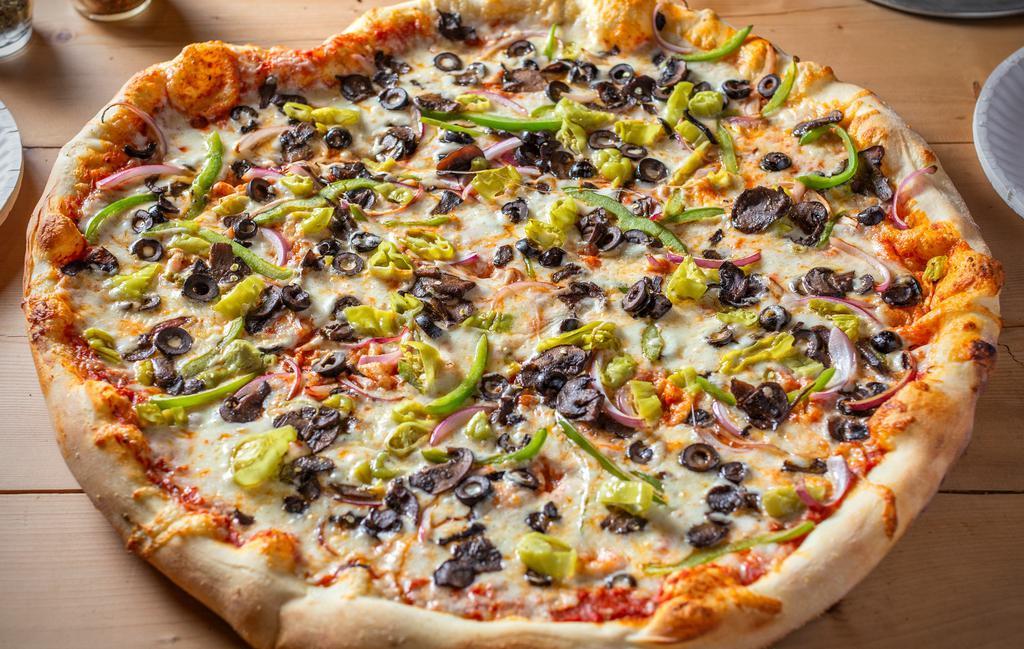 The Florence Ballard · Bell peppers, red onions, mushrooms, black olives, and pepperoncini on a marinara base.