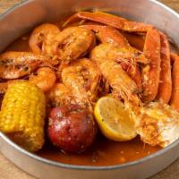 Combo C · Includes 1/2 an order of shrimp and 1/2 an order of snow crab , 2 add ons (sausage, corn, po...
