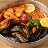 Combo D · Includes 1/2 an order of shrimp , 1/2 an order of snow crab , and 1 order of mussel , 2 add ...