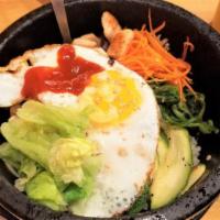 Hot Stone Bibimbap · Hot stone with your choice of beef, chicken, tofu or shrimp with vegetables and fried egg la...