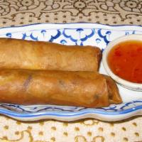 Siam Spring Rolls (2) · Deep-fried with stuffed ground pork, bean thread, and a mixture of vegetables, served with s...