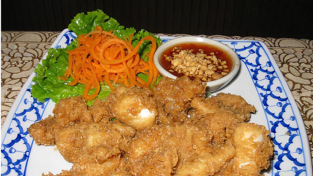 Crispy Squid · Deep fried squid served with sweet and sour sauce.