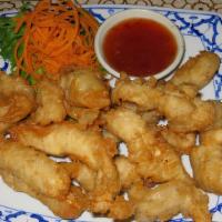 Crispy Fried Chicken · Chunked chicken breast lightly battered and quick fried, served with sweet and sour sauce.