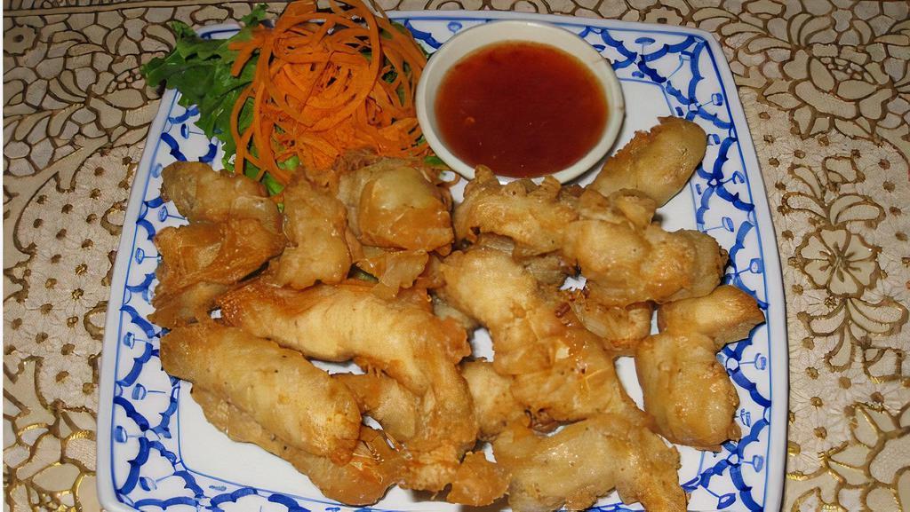 Crispy Fried Chicken · Chunked chicken breast lightly battered and quick fried, served with sweet and sour sauce.