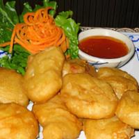 Crispy Fried Chicken Nugget · Golden deep fried chicken nugget. Served with sweet and sour sauce.