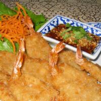 Butterfly Crispy Shrimp · Deep-fried shrimp served with sweet and sour sauce.