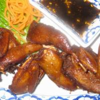 Fried Quail · Deep-fried quails served with spicy sauce.
