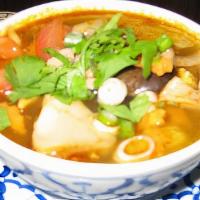 Tom Yum Hop Pot · Hot and sour soup with chicken, mushroom, lemon grass, tomatoes, lime juice.