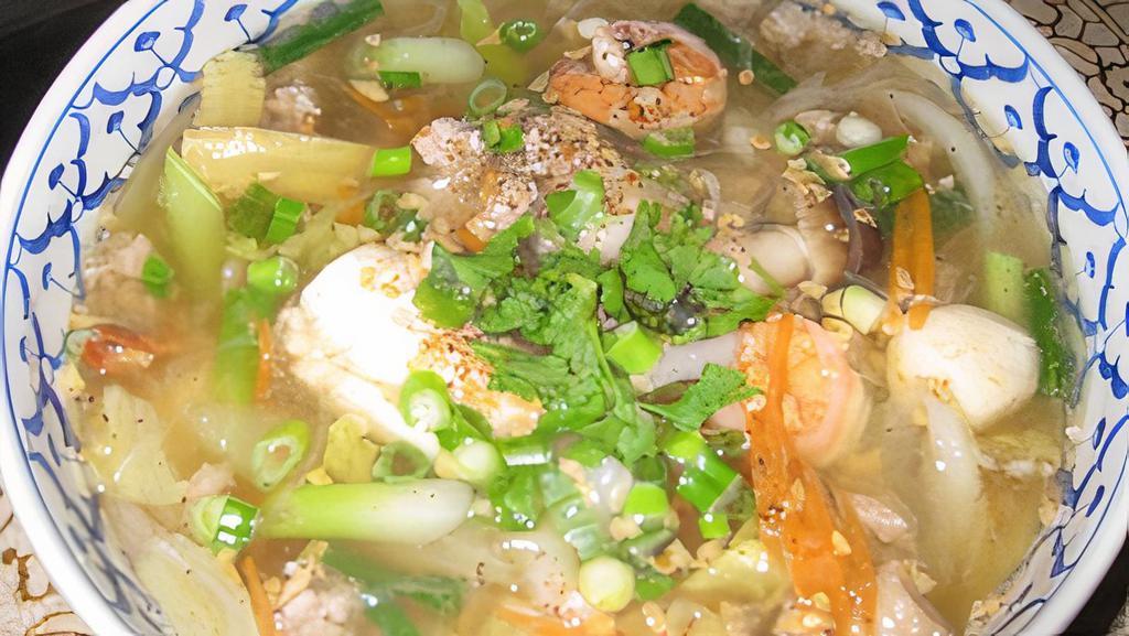 Crystal Noodle Soup · Bean thread noodle in a light broth with ground pork, shrimp, seafood ball, nappa, mushroom, and carrot.