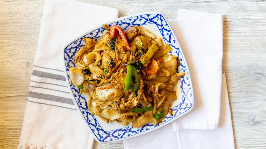 Drunken Noodle · Soft wide rice noodle with long bean, carrot, baby corn, onion and holy basil. Choice of beef, pork, chicken.