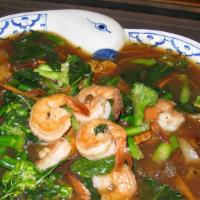 Rad Nar · Stir fried soft wide rice noodle topped with gravy made of Chinese broccoli, broccoli. Choic...