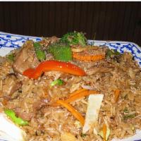 Bangkok Fried Rice · Stir fried rice with chili, onion, green bean, and sweet basil. Choice of beef, pork, chicken.