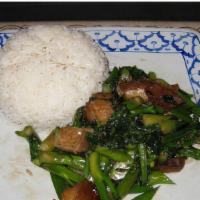 Roasted Pork & Chinese Broccoli Over Rice · Stir fried Chinese broccoli with roasted pork and oyster sauce over rice.