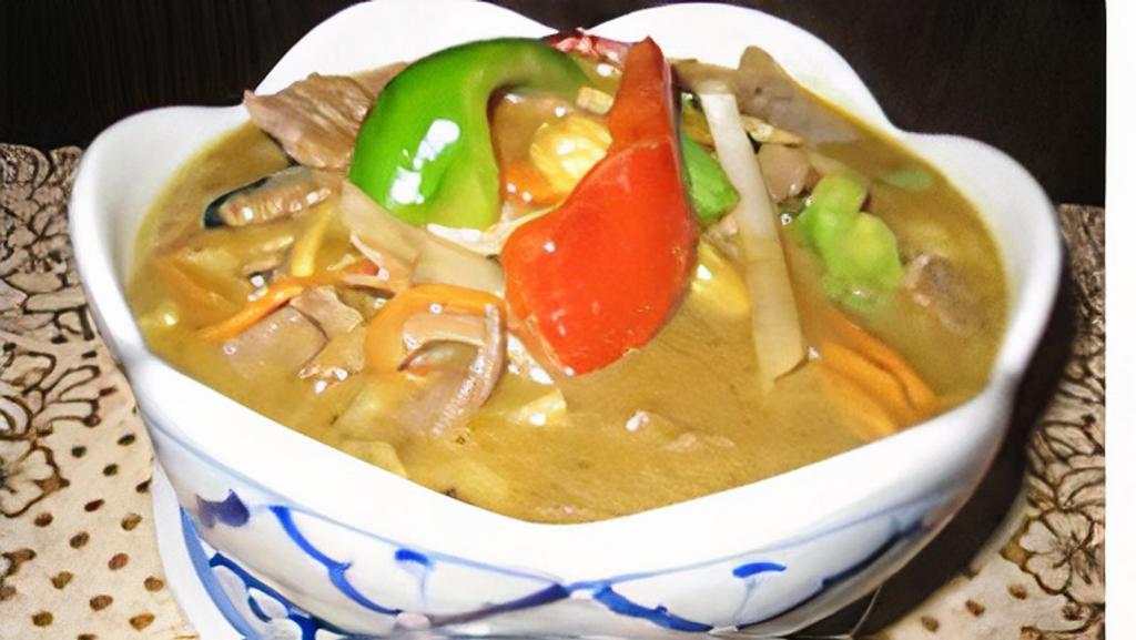 Green Curry · Spicy. Choice of meat and mixed vegetables in our green curry sauce.