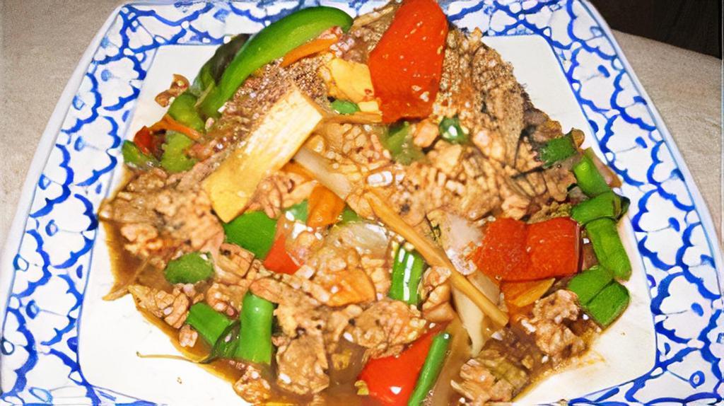 Pad Ka Paow · Choice of meat with green bean, carrot, onion, baby corn, and holy basil a in chef’s special sauce.