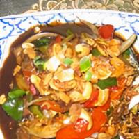 Pad Cashew Nuts · Spicy. Choice of meat with onion, water chestnut, bamboo, carrot, bell pepper, and crunchy c...