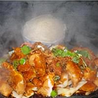 Siam Volcano · Spicy. Lightly batter chicken or substitute for shrimp serve on the bed of sautéed vegetable...