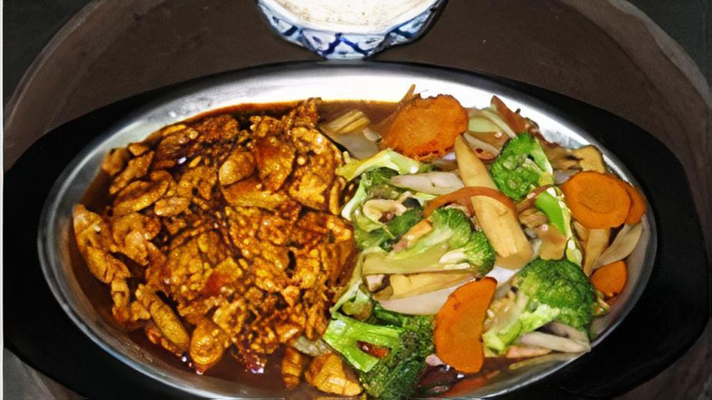 Chef’S Secret · A unique Thai taste tender chicken or seafood sautéed in our secret sauce served with sautéed vegetables on the side.