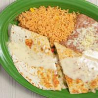 Fajita Quesadilla · A steak or chicken quesadilla filled with onion, bell peppers, tomatoes shredded and topped ...