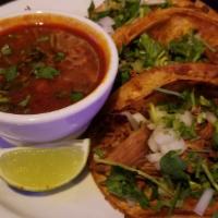 3 Birria Tacos With Consome · 3 tacos - with shredded beef, on soft corn tortillas, topped with onion and cilantro, served...
