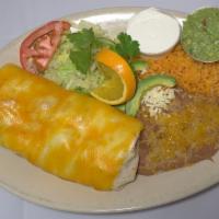 Grande Burrito Dinner · One large burrito with your choice of meat, beans lettuce cheese tomatoes inside, served wit...