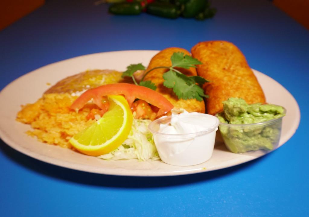 1 Chimichanga Dinner · 1 large chimichanga with your choice of meat, served with rice & beans and a side of guacamole and sour cream