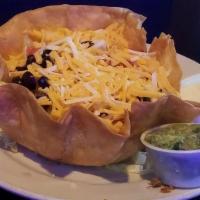 Taco Salad · your choice of meat, beans lettuce, cheese, tomatoes and black olives, side of guacamole and...