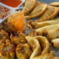 Appetizer Sampler · Serves Four or More! A generous sampling (20 pieces) of our most popular appetizers includin...