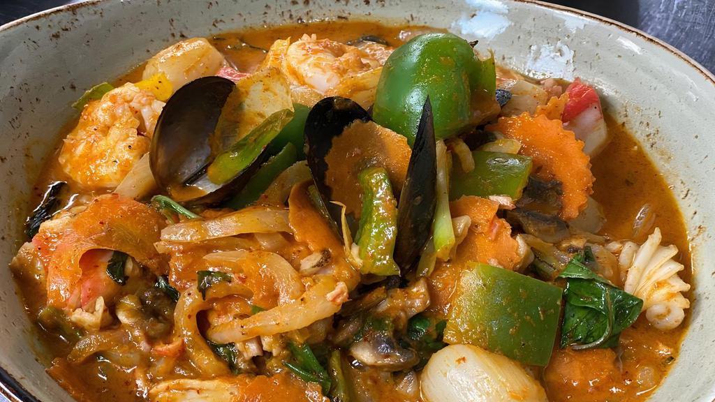 Fisherman'S Madness · A saute of seafood combination with onion, mushroom, bell pepper and sweet basil leaves in hot chili and . Thai spices. **Spice level starts at 2