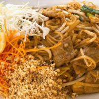 Pad Thai · A very famous Thai dish. Stir-fried thin rice noodles with egg, bean sprouts, green onions, ...