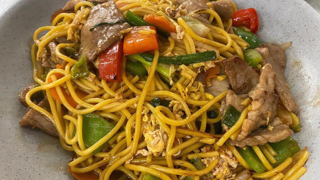 Lo Mein · Wheat egg noodles tossed with vegetables and your choice of meat in light soy sauce