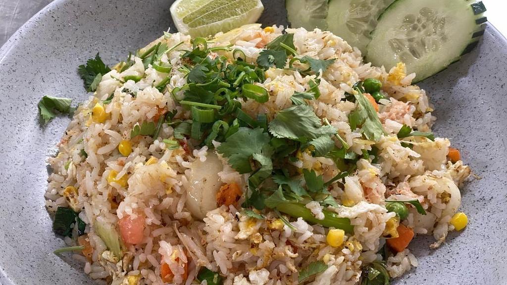 Crab Fried Rice · Our special gluten free stir-fried white rice with real crabmeat, egg, onion, corn, pea, carrot and tomato