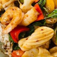 Brown Rice Seafood · A special brown rice tossed with stir-fried shrimp, sea scallop, calamari, mussel, clams, im...
