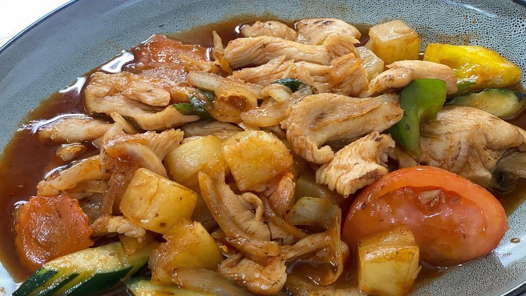 Sweet Sour · Thai-style stir-fried pineapple, tomato, onion, bell pepper, carrot, zucchini and your choice of meat cooked with tangy sweet & sour sauce