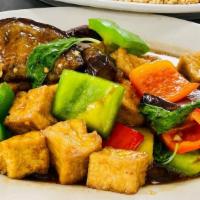 Eggplant Lover · Stir-fried eggplant, bell pepper, Thai basil and your choice of meat with Thai soy bean sauce