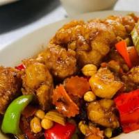 Kung Pao Chicken · Crispy chicken stir-fried with roasted peanuts, chili pepper, bell pepper, carrot and celery...